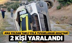 Ana yoldan takli yola yuvarlanan araçtaki 2 kişi yaralandı