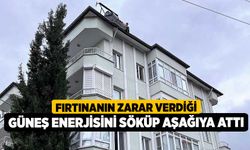 Fırtınanın zarar verdiği güneş enerjisini söküp aşağıya attı