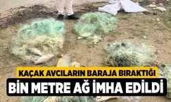 Kaçak avcıların baraja bıraktığı bin metre ağ imha edildi