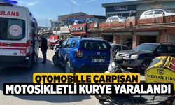 Otomobille çarpışan motosikletli kurye yaralandı