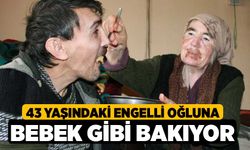 43 Yaşındaki Engelli Oğluna Bebek Gibi Bakıyor