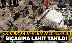 Doğal gaz kazısı yapan kepçenin bıçağına lahit takıldı