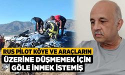 Rus pilot köye ve araçların üzerine düşmemek için göle inmek istemiş