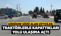 Görüşme sözü alan çiftçiler, traktörlerle kapattıkları yolu ulaşıma açtı