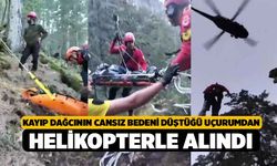 Kayıp dağcının cansız bedeni düştüğü uçurumdan helikopterle alındı