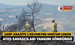 Sarp araziye 2 kilometre hortum çeken ateş savaşçıları yangını söndürdü