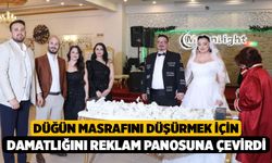 Düğün masrafını düşürmek için damatlığını reklam panosuna çevirdi