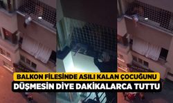 Balkon Filesinde Asılı Kalan Çocuğunu Düşmesin Diye Dakikalarca Tuttu