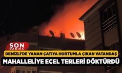 Denizli'de yanan çatıya hortumla çıkan vatandaş mahalleliye ecel terleri döktürdü