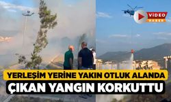 Yerleşim yerine yakın otluk alanda çıkan yangın korkuttu