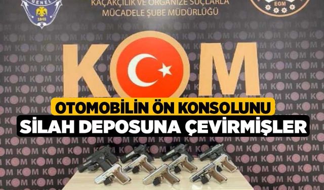 Otomobilin ön konsolunu silah deposuna çevirmişler