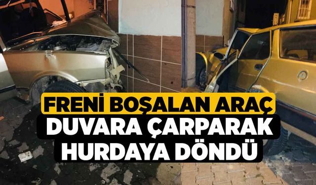 Freni boşalan araç duvara çarparak hurdaya döndü