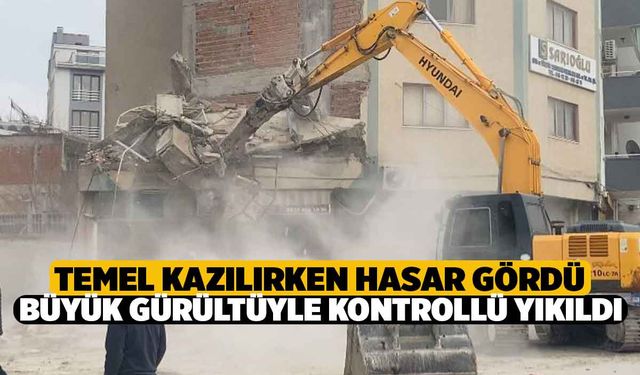 Sarayköyde Temel Kazısında hasar görünce iş makineleriyle desteklenen bina kontrollü olarak yıkıldı