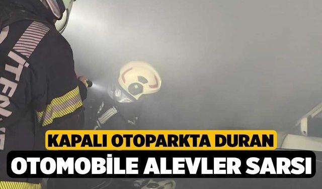 Kapalı otoparkta duran otomobile alevler sarsı
