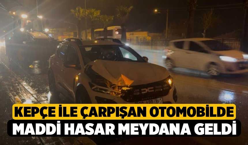 Kepçe ile çarpışan otomobilde maddi hasar meydana geldi